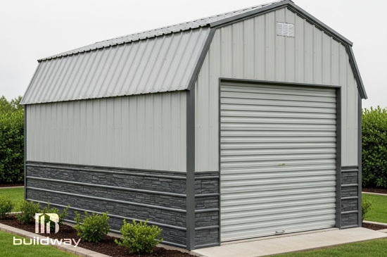 Light gray metal storage shed with a barn-style roof and roll-up door, featuring stone-textured siding on the lower half, ideal for equipment or vehicle storage.