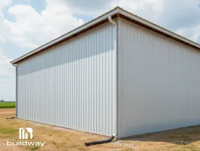 Light gray CFS structure with a sloped roof and integrated gutter system, installed by Buildway.